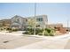 Beautiful two-story home featuring an attached two-car garage and well-maintained front yard landscaping at 7002 Fossil Rim St, North Las Vegas, NV 89084