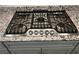 Close-up of a stainless steel Frigidaire Professional gas cooktop with five burners at 7265 Southern Magnolia St, Las Vegas, NV 89149