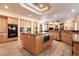 Spacious kitchen featuring a center island and stainless steel appliances at 7718 Willow Cove Cir, Las Vegas, NV 89129