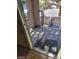 The building features a balcony and entrance with gated patio offering privacy and a welcoming entrance at 7730 Secret Shore Dr # 207, Las Vegas, NV 89128