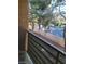Exterior balcony featuring a stucco wall and wrought iron railing at 7730 Secret Shore Dr # 207, Las Vegas, NV 89128