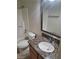 Cozy bathroom featuring a granite countertop vanity, toilet and shower tub at 7730 Secret Shore Dr # 207, Las Vegas, NV 89128