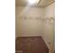 Walk-in closet with wire shelving offers ample storage for your wardrobe and accessories at 7730 Secret Shore Dr # 207, Las Vegas, NV 89128