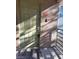 Close-up of the entrance door of unit 207, featuring a secure lock system and a doormat for a clean entrance at 7730 Secret Shore Dr # 207, Las Vegas, NV 89128