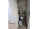 Utility closet with a water heater and shelving inside a home at 7730 Secret Shore Dr # 207, Las Vegas, NV 89128