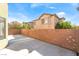 Backyard view showcases the concrete patio and block wall, providing privacy and space at 8109 Retriever Ave, Las Vegas, NV 89147