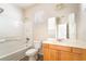 Traditional bathroom with a tub-shower, toilet, and single vanity with ample storage space at 8109 Retriever Ave, Las Vegas, NV 89147