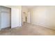 Neutral bedroom features plush carpeting and large closet; interior doors open to a hallway at 8109 Retriever Ave, Las Vegas, NV 89147