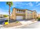 Charming two-story home with a two-car garage, balcony, and landscaped front yard at 8109 Retriever Ave, Las Vegas, NV 89147