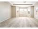 The spacious main bedroom features large windows to let in plenty of natural light at 8109 Retriever Ave, Las Vegas, NV 89147