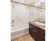 Bathroom with granite vanity, and a tub with shower at 8255 Las Vegas Blvd # 117, Las Vegas, NV 89123