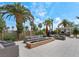 Community patio with lounge seating, fire pit, and lush landscaping at 8255 Las Vegas Blvd # 117, Las Vegas, NV 89123