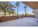 Private patio with views of palm trees and landscaping at 8255 Las Vegas Blvd # 117, Las Vegas, NV 89123