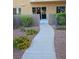 Landscaped walkway leading to the residence at 8255 Las Vegas Blvd # 117, Las Vegas, NV 89123