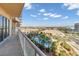 Balcony view overlooking a pool and palm trees, offering a serene outdoor space and city views at 8255 Las Vegas Blvd Blvd # 719, Las Vegas, NV 89123