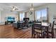 Spacious living room features wood floors, a ceiling fan, and large windows with city views at 8255 Las Vegas Blvd Blvd # 719, Las Vegas, NV 89123