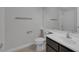 Bathroom featuring a toilet, vanity sink, and mirror at 829 Dancing Vines Ave, Las Vegas, NV 89183