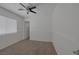 Bedroom featuring carpet flooring, a ceiling fan, and neutral-colored walls at 829 Dancing Vines Ave, Las Vegas, NV 89183