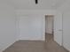 Bedroom featuring carpet flooring, a closet with sliding doors, and neutral-colored walls at 829 Dancing Vines Ave, Las Vegas, NV 89183