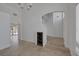 Spacious living room featuring tile flooring and an elegant archway at 829 Dancing Vines Ave, Las Vegas, NV 89183