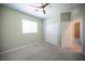 Comfortable bedroom featuring plush carpeting, a window, and a ceiling fan at 871 Aurelie Ridge St, Henderson, NV 89011