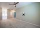 Spacious bedroom featuring neutral walls, plush carpeting, and a modern ceiling fan at 871 Aurelie Ridge St, Henderson, NV 89011