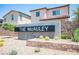 The McAuley community sign with manicured landscaping including succulents and cacti at 871 Aurelie Ridge St, Henderson, NV 89011