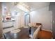 Open-concept dining area that flows to the kitchen with neutral decor at 9322 Straw Hays St # 103, Las Vegas, NV 89178