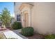Charming entrance to home with covered porch, manicured landscaping, and front door at 9322 Straw Hays St # 103, Las Vegas, NV 89178