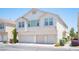 Charming multi-Gathering home featuring a three-car garage and stucco facade in a residential community at 9322 Straw Hays St # 103, Las Vegas, NV 89178