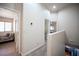 Hallway featuring rooms and neutral tones, offering inviting transitions between living spaces at 9322 Straw Hays St # 103, Las Vegas, NV 89178