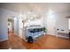 Open concept living space with breakfast bar and natural light throughout at 9322 Straw Hays St # 103, Las Vegas, NV 89178