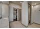 Bright bathroom featuring a walk-in closet and adjacent toilet room for added privacy and convenience at 9921 Mirada Dr, Las Vegas, NV 89144