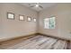 Bright bedroom featuring hardwood floors, recessed lighting and a ceiling fan at 9921 Mirada Dr, Las Vegas, NV 89144