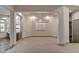 Open dining room with modern chandelier, neutral paint, and ample space at 9921 Mirada Dr, Las Vegas, NV 89144