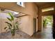 Contemporary home entrance with a desert landscape at 9921 Mirada Dr, Las Vegas, NV 89144