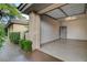 Spacious garage with an automatic door opener, epoxy flooring, and access to an interior door at 9921 Mirada Dr, Las Vegas, NV 89144