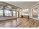 Stylish living area boasting a wet bar, wine fridge, and natural light at 9921 Mirada Dr, Las Vegas, NV 89144