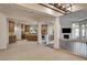Open living space featuring a gourmet kitchen and fireplace at 9921 Mirada Dr, Las Vegas, NV 89144