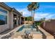 Beautiful pool with privacy wall and desert landscaping, creating a tranquil oasis at 9921 Mirada Dr, Las Vegas, NV 89144