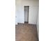 Cozy bedroom featuring neutral carpet and a spacious closet with sliding doors for storage at 1336 N Jones Blvd, Las Vegas, NV 89108