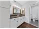Bathroom featuring a vanity with granite countertop, a mirror, and an adjacent toilet at 1405 Vegas Valley Dr # 98, Las Vegas, NV 89169