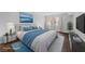 Staged bedroom with a comfortable bed, stylish decor, and natural light from the window at 1405 Vegas Valley Dr # 98, Las Vegas, NV 89169
