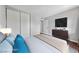 Modern bedroom with a large closet, dresser, and TV for ultimate comfort and convenience at 1405 Vegas Valley Dr # 98, Las Vegas, NV 89169