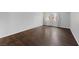 Cozy bedroom featuring hardwood floors, neutral walls, and bright window at 1405 Vegas Valley Dr # 98, Las Vegas, NV 89169