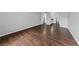 Bedroom featuring hardwood floors, access to bathroom, and neutral walls at 1405 Vegas Valley Dr # 98, Las Vegas, NV 89169