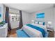 Staged bedroom with a comfortable bed, stylish decor, and natural light from the window at 1405 Vegas Valley Dr # 98, Las Vegas, NV 89169