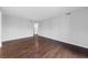 Neutral bedroom featuring hardwood floors and a minimalist design at 1405 Vegas Valley Dr # 98, Las Vegas, NV 89169