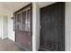 Secured front entrance featuring a decorative metal door and window guard, enhancing curb appeal at 1405 Vegas Valley Dr # 98, Las Vegas, NV 89169