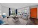 Cozy living room featuring modern furnishings and a bright, open floor plan with access to the balcony at 1405 Vegas Valley Dr # 98, Las Vegas, NV 89169